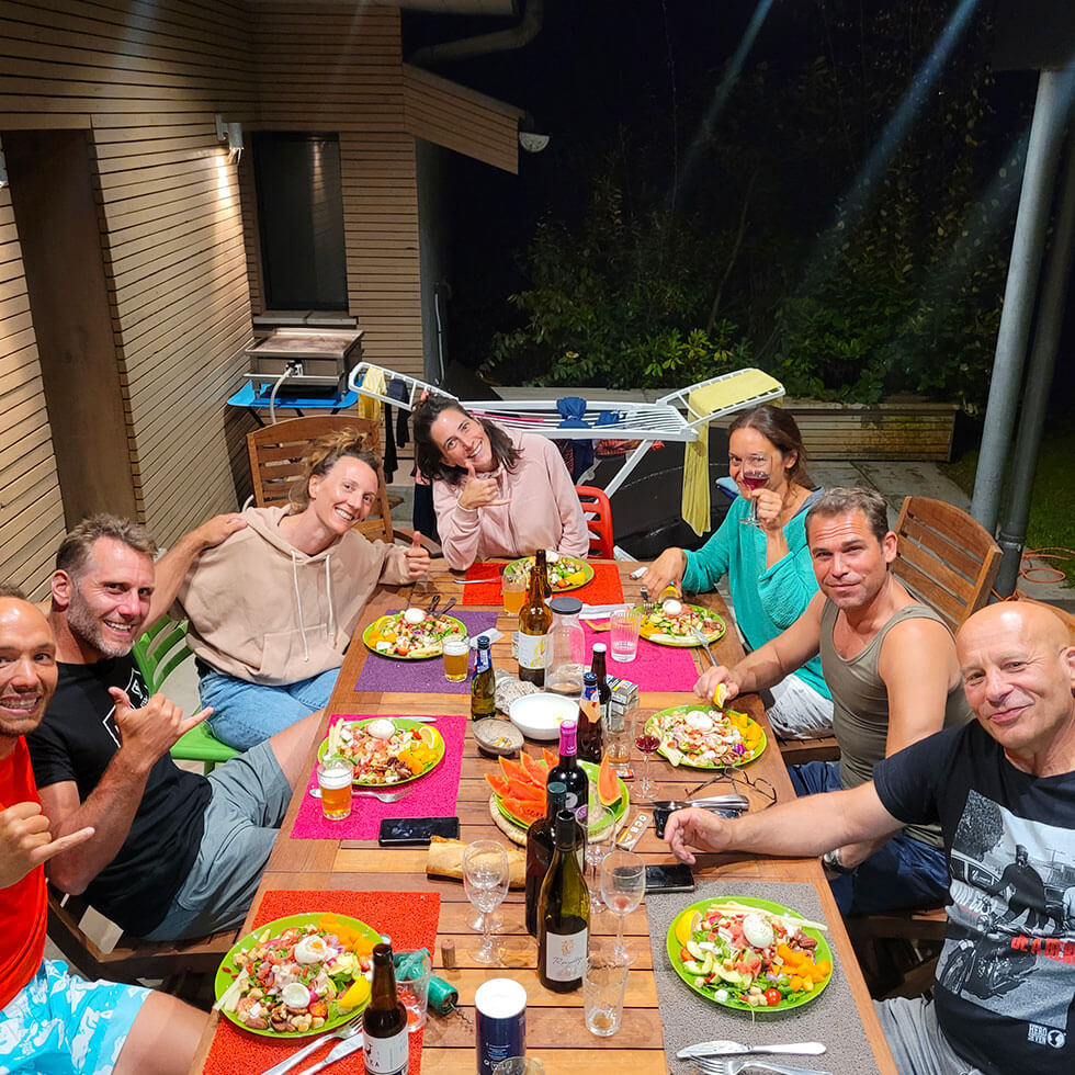 Group of friends sharing a meal on the terrace